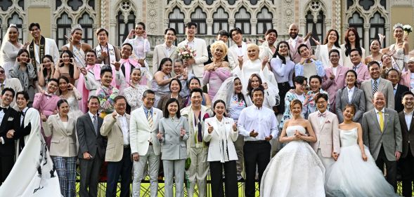Thailand's Prime Minister Paetongtarn Shinawatra poses for photos with same-sex couples and members of LGBTQ community to promote "Marriage Equality Day" at the Government House in Bangkok on January 15, 2025