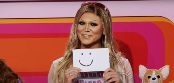 Crystal Envy as Nicole Ritchie on season 17 of RuPaul's Drag Race.