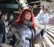 Ana Matronic at a train station holding a balloon