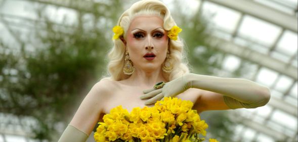 Drag star Marmalade in a yellow dress made of daffodils