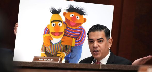 U.S. Rep. Robert Garcia (D-CA) speaks in front of poster of Sesame Street's Bert and Ernie during a House Oversight and Government Reform Committee hearing at the U.S. Capitol on March 26, 2025 in Washington, DC. The heads of NPR and PBS appeared before the House Subcommittee on Delivering on Government Efficiency to address allegations of bias in their programming against conservatives.