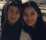 Maryam and Parwen hugging.