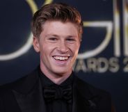 A close up shot of Robert Irwin smiling at the camera