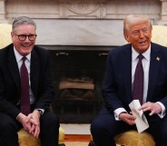UK Prime Minister Sir Keir Starmer hands an invitation from King Charles III for a second state visit to U.S. President Donald Trump at the White House.