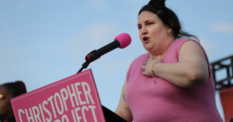 Lena Dunham speaks at the 'Trans Day of Visibility Rally' hosted by the Christopher Street Project on the National Mall in Washington, D.C. on March 31, 2025. Several hundred people gathered to listen to guest speakers and members of Congress speak against what organizers say are relentless attacks from the Trump administration on the transgender community. (Photo by Bryan Dozier / Middle East Images / Middle East Images via AFP) (Photo by BRYAN DOZIER/Middle East Images/AFP via Getty Images)