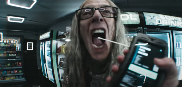 A still from the Black Mirror season 7 treailer showing Peter Capaldi with long grey hair