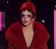 Suzie Toot on the drag race main stage in season 17.