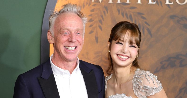 The White Lotus creator Mike White and star Lisa smile at the red carpet premiere of The White Lotus season three.