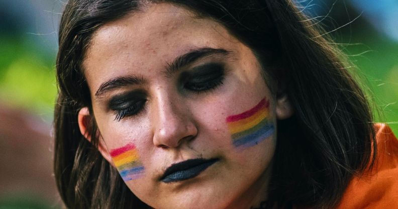 A person applying make-up.