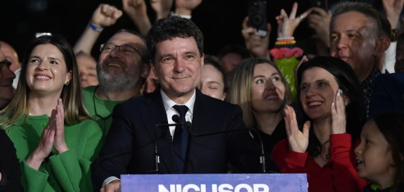 Presidential candidate Nicusor Dan speaks to media after polls closed for the second round of the country's presidential election redo in Bucharest, Romania on May 18, 2025.