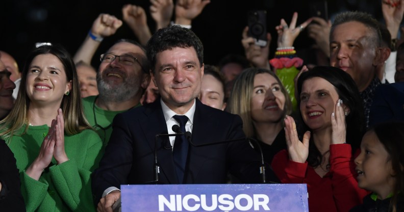 Presidential candidate Nicusor Dan speaks to media after polls closed for the second round of the country's presidential election redo in Bucharest, Romania on May 18, 2025.