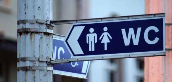 A "WC" bathroom sign.