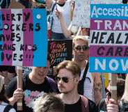 Protesters carry placards against the ban on puberty blockers and for accessible trans healthcare as transgender people and their supporters march through central London during the sixth Trans Pride protest march for transgender freedom and equality in the UK and globally in London, United Kingdom on July 27, 2024.