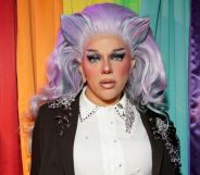 Aja attends as RuPaul's Drag Race All Stars 10 visit the Stonewall Inn NYC on May 06, 2025 in New York City. She is wearing a violet wig with horns, a white shirt and dark blazer.