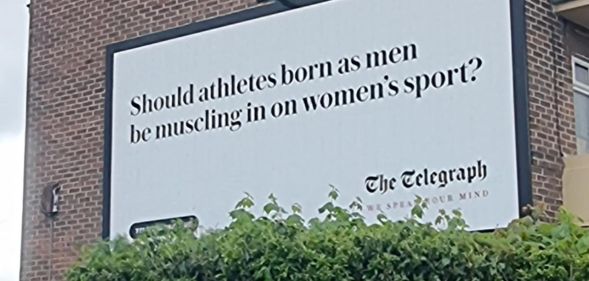A billboard from the Telegraph which reads: "Should athletes born as men be muscling in on women's sports?"