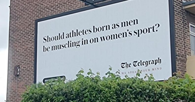 A billboard from the Telegraph which reads: "Should athletes born as men be muscling in on women's sports?"