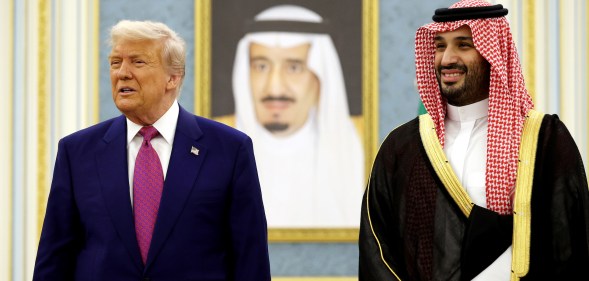 RIYADH, SAUDI ARABIA - MAY 13: U.S. President Donald Trump and Saudi Crown Prince Mohammed bin Salman interact with officials during a “coffee ceremony” at the Saudi Royal Court on May 13, 2025, in Riyadh, Saudi Arabia. Trump begins a multi-nation tour of the Gulf region focused on expanding economic ties and reinforcing security cooperation with key U.S. allies. (Photo by Win McNamee/Getty Images)