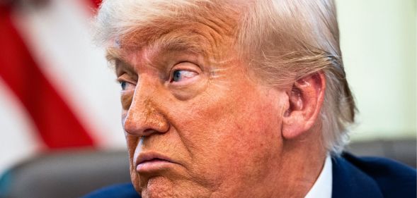 A side-profile image of Donald Trump.