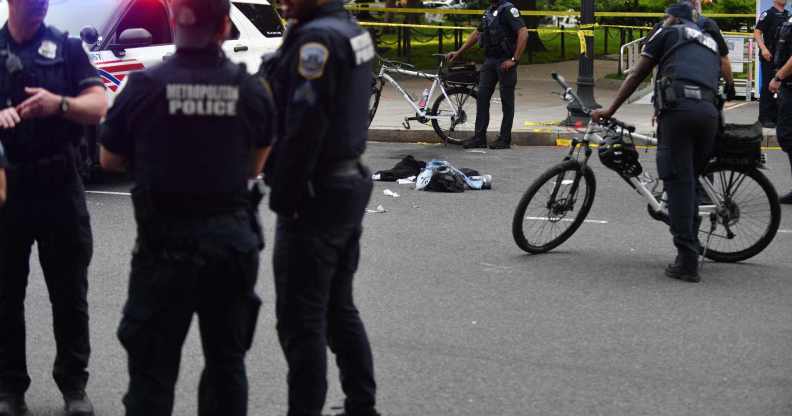 Clothing and medical emergency items are seen on the street where two people were stabbed at the re-opened Dupont Circle park in Washington, D.C., June 7, 2025