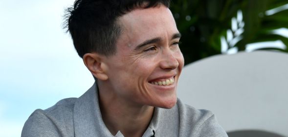 Elliot Page, pictured smiling.