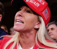 Marjorie Taylor Greene, pictured wearing a MAGA hat.