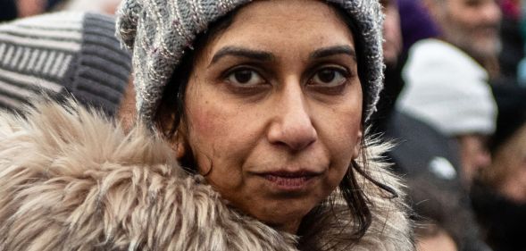 Suella Braverman, pictured looking directly towards the viewer.