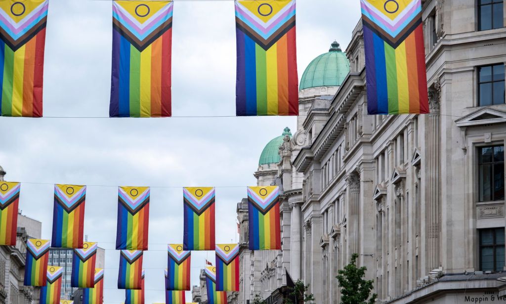 A set of Progress Pride flags in Regent Street, London.