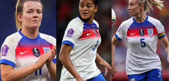 Lauren Hemp, Jess Carter and Leah Williamson on the pitch in the England football kit.