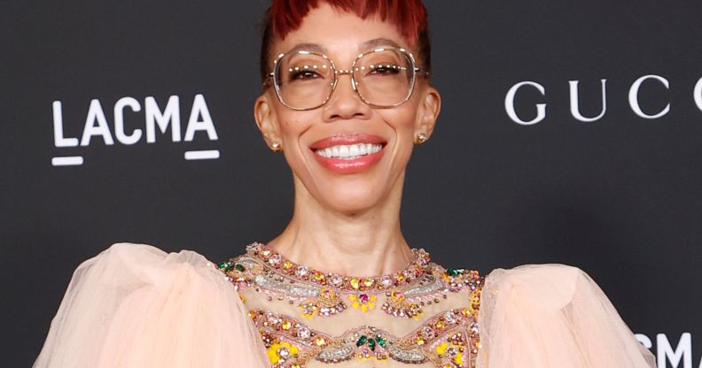 Amy Sherald, pictured smiling at a red carpet show.