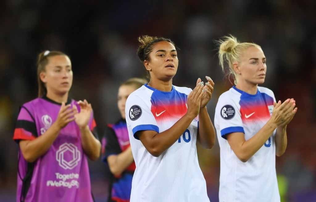 Jess Carter and Alex Greenwood of England applaud the fans following defeat at the end of the UEFA Women's EURO 2025 Group D match between France and England at Stadion Letzigrund