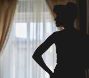 Silhouette of a girl at a window.