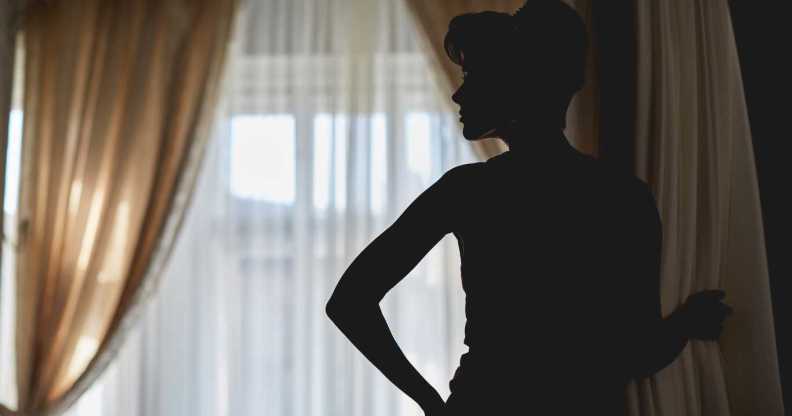 Silhouette of a girl at a window.