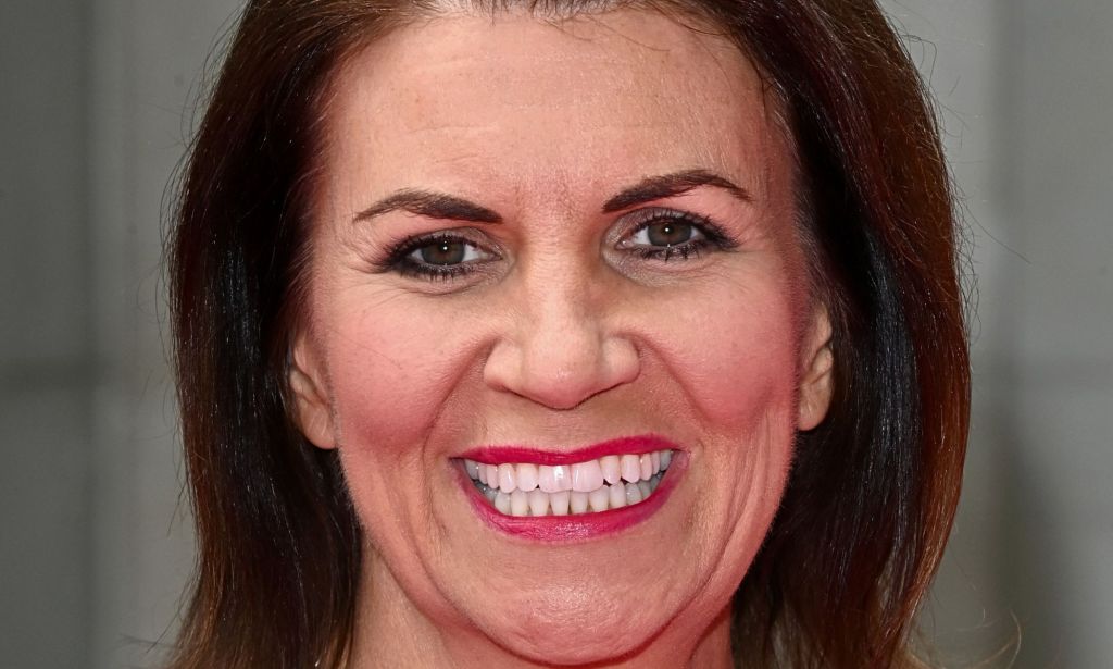 TalkTV host, Julia Hartley-Brewer, pictured smiling.