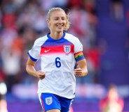 Leah Williamson of England celebrates after teammate Georgia Stanway (not pictured) scores her team's second goal during the UEFA Women's EURO 2025 Group D match between England and Netherlands