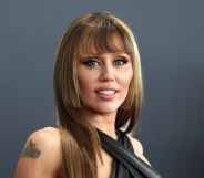 Miley Cyrus in a black dress and brown bangs at the 2025 Grammy Awards.