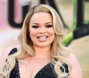 Trisha Paytas smiles on the red carpet at the Wicked premiere in 2024.