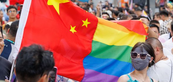 A half-Chinese, half-LGBTQ+ flag.