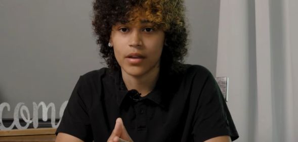 Gerika Mudra, pictured sat at a table.