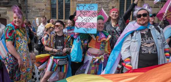People take part in the annual Durham Pride parade through the city on 25 May, 2025.