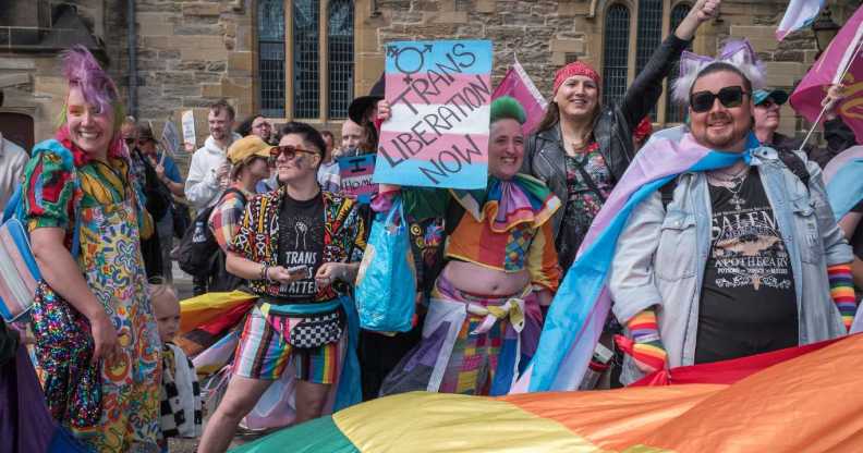 People take part in the annual Durham Pride parade through the city on 25 May, 2025.