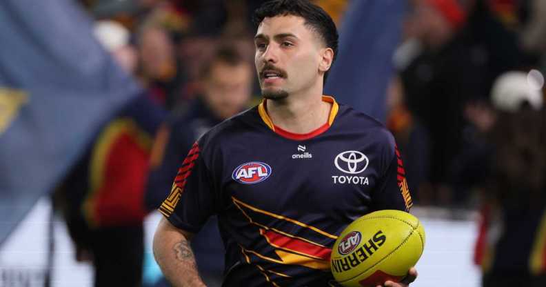 Izak Rankine of the Crows warms up during the 2025 AFL Round 23 match between the Adelaide Crows and the Collingwood Magpies at Adelaide Oval on August 16, 2025 in Adelaide, Australia.