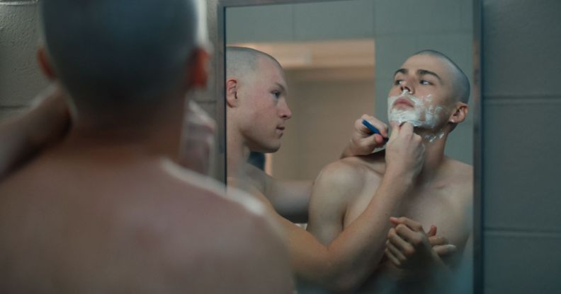 Miles Heizer shaves as a military recruit in Netflix show BOOTS.