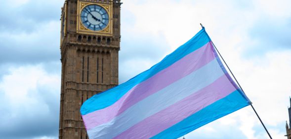 A trans flag in front of Big Ben.