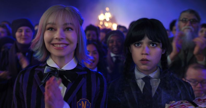 Emma Myers and Jenna Ortega as Enid and Wednesday in season two of Wednesday.