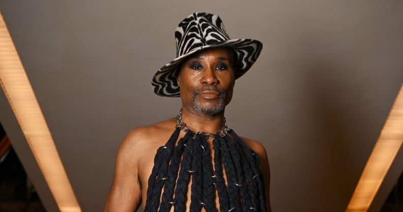 Billy Porter poses in a hat and fringe vest in May 2025.