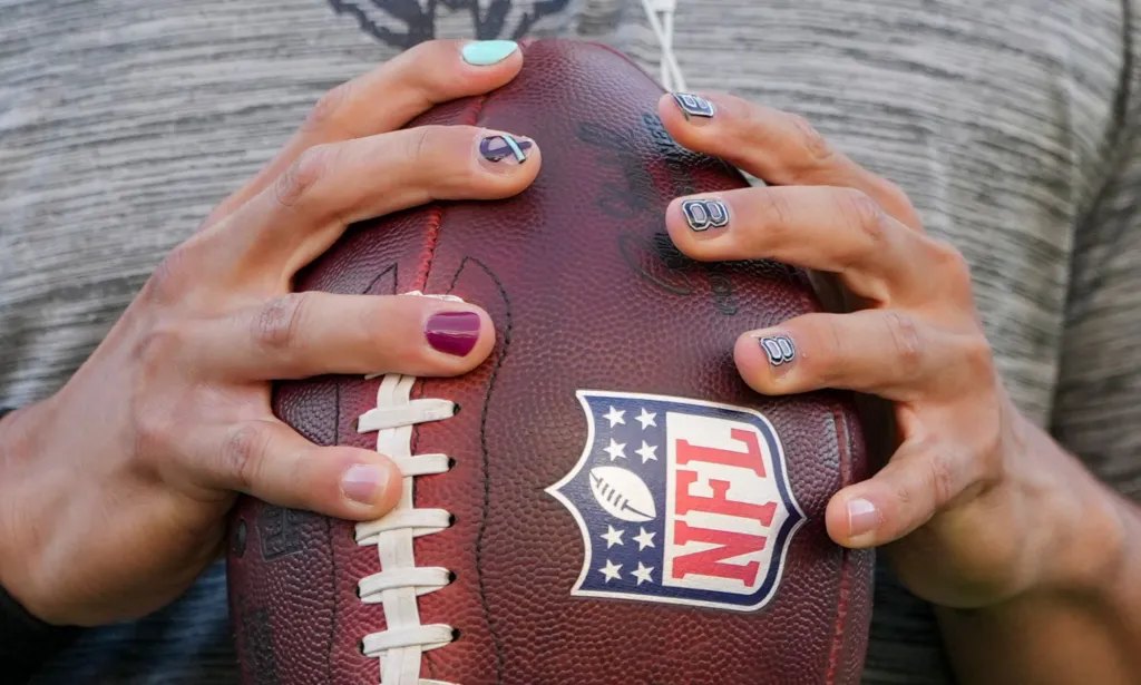 Caleb Williams' nails during a match against the Minnesota Vikings.