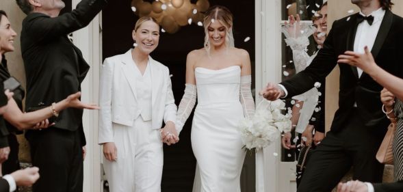 Emilia and Lucy Spraggan-Smith at their drinks reception during their wedding in 2024.