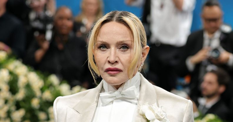 Madonna in a white suit at the met gala in may 2025.