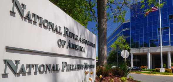 A sign marks the entrance to the National Rifle Association (NRA) headquarters building.