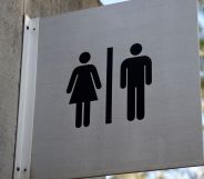 A public toilets sign.